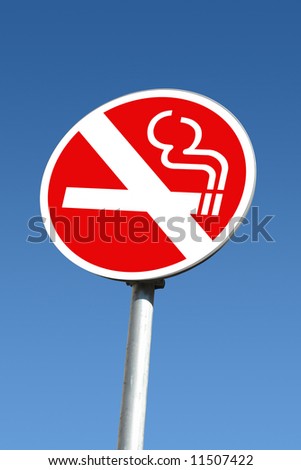 No smoking signpost over blue sky