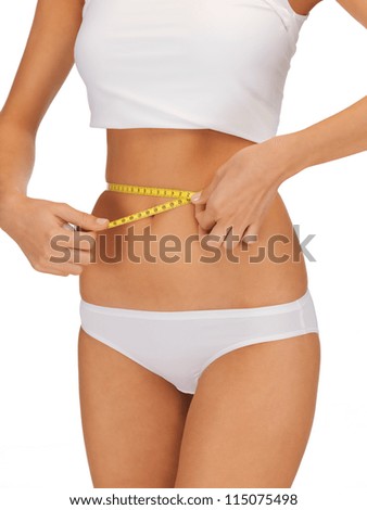 closeup picture of woman with measure tape