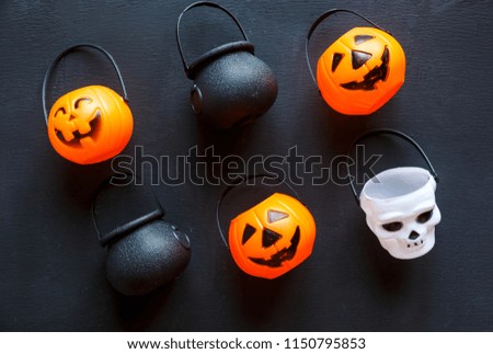 Halloween background with pattern of jack lanterns, cauldrons, skulls. creative decoration, celebration, autumn concept 