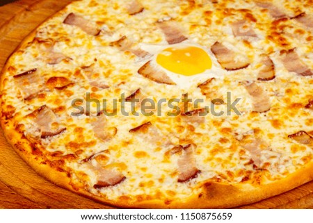Pizza Carbonara with egg and ham