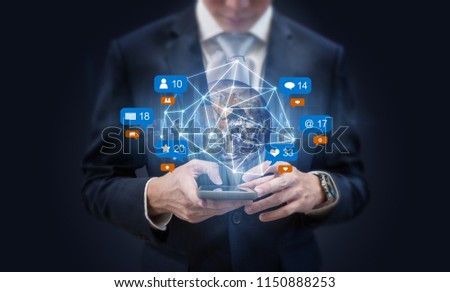 Businessman using mobile smart phone, and augmented reality with social media, network notification icons. Element of this image are furnished by NASA