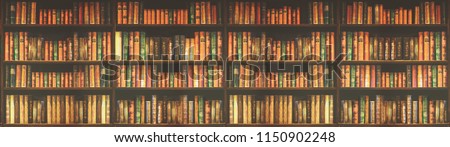 panorama blurred bookshelf Many old books in a book shop or library. Royalty-Free Stock Photo #1150902248