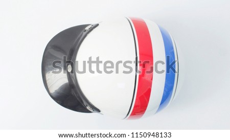 Blue white red motorcycle helmet on a white background.
