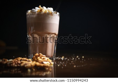 Coffee drinks on a black background. Coffee on a black table. Cold coffee. Latte. Cappuccino. Espresso. Coffee cocktails. Milkshakes. Whipped cream. Barista
 Royalty-Free Stock Photo #1150994243