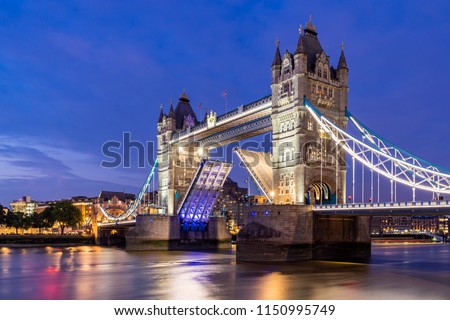 London Tower Bridge lifting up at Sunset dusk, London UK. Royalty-Free Stock Photo #1150995749