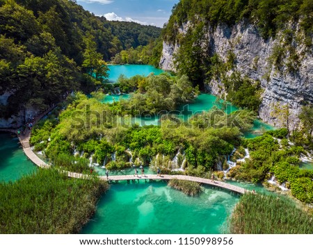 Several waterfalls of one of the most astonishing Plitvice Lakes, Croatia. A truly virgin and wonderful piece of nature. Royalty-Free Stock Photo #1150998956