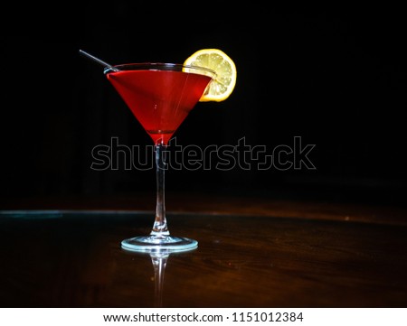 Fresh cocktail on a black background. Alcoholic cocktail on a black background. Fruit with a cocktail. Non-alcoholic cocktail. Mix of cocktails on a black background.  Royalty-Free Stock Photo #1151012384