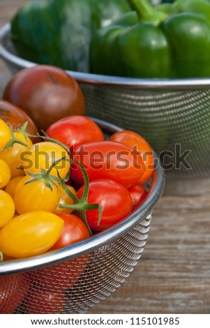 fresh tomatoes and pepper/vegetables/harvest