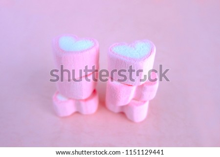 Set of heart marshmallow on pink background, Heart marshmallow arranged as layers. Sweet background
