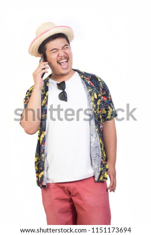 Good mood young man in hawaiian costume talking on the phone received travel isolated on white background.