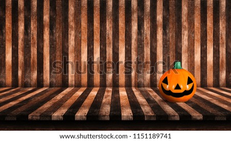 Pumpkin made from plastic on wooden tabletop. For your product placement or montage with focus to the table top in the foreground. Halloween and decoration concept