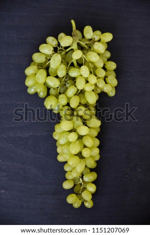 Grapes on a gray background.