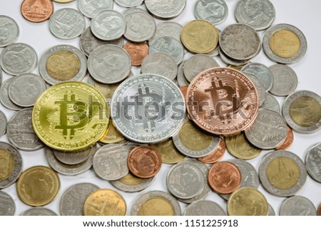 Gold, Silver and Bronze It is a digital currency with Thai baht coins placed on a white background.Save and make a better lifestyle​ concept.Do not focus on objects.