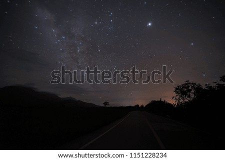 Sky night with mountains landscape with firefly