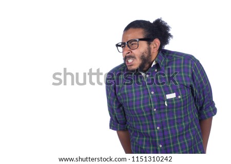 Angry man clenching his teeth, wearing shirt and eyeglasses, isolated on white background