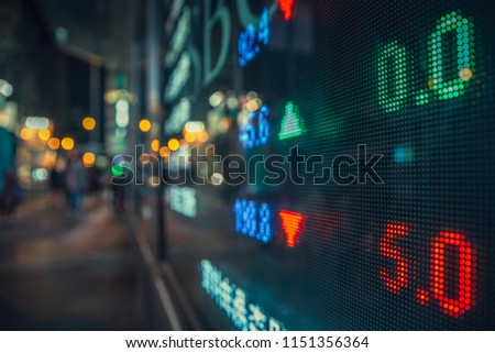 Display stock market numbers and graph on the street Royalty-Free Stock Photo #1151356364