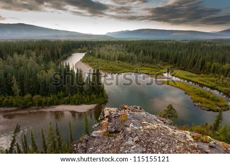 Boreal forest wilderness in beautiful McQuesten River valley in central Yukon Territory, Canada Royalty-Free Stock Photo #115155121