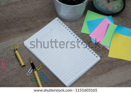 office desk concept or study table with equipment or books and notes