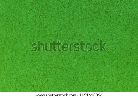 Green paper texture abstract background.