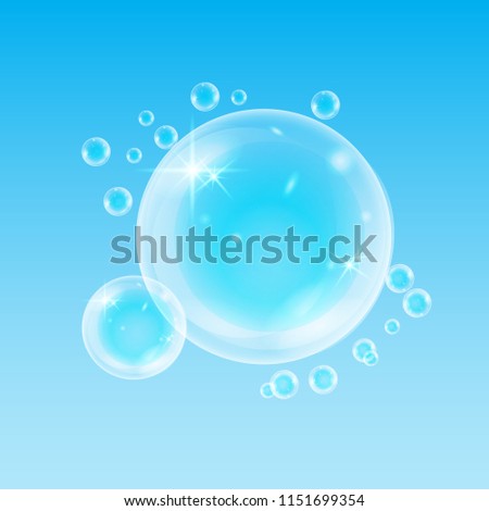 Realistic soap bubbles with rainbow reflection set isolated on the blue background. vector Illustration