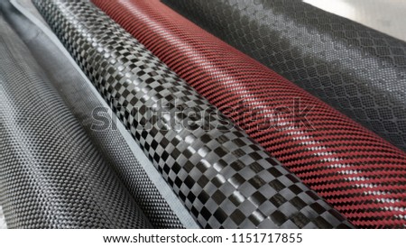 Black carbon fiber composite material on the roll