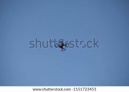 Drone on blue sky