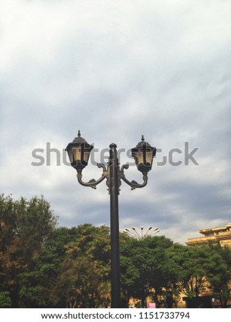 street lamp on a background of clouds