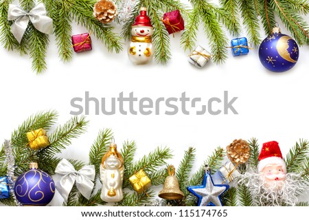 Christmas background border with fir and baubles on white
