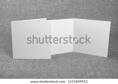 Mockup of white booklet on gray background