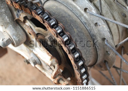 motorcycle chain / close up of old rear chains in wheel motorcycle and sprocket 