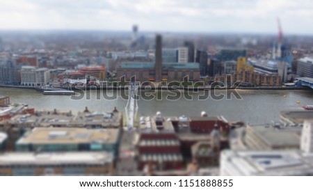TILT SHIFT EFFECT - View of London from above. Millennium Bridge from St Paul's Cathedral, UK. 