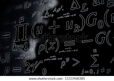 Large number of mathematical formulas neon on a black  background