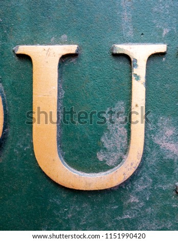 Written Wording in Distressed State Typography Found Letter U