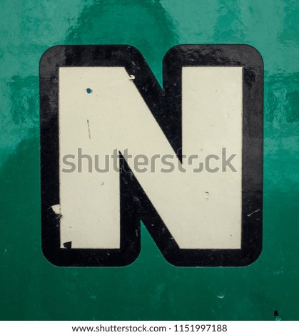 Written Wording in Distressed State Typography Found Letter N