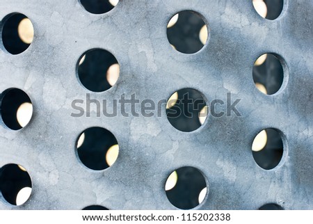 Texture of sheet iron with holes.
