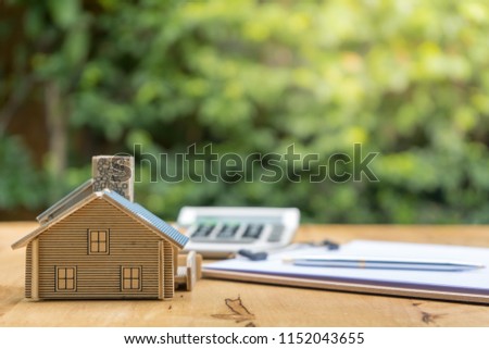 Business Signing a Contract Buy - sell house, insurance agent analyzing about home investment loan Real Estate concept