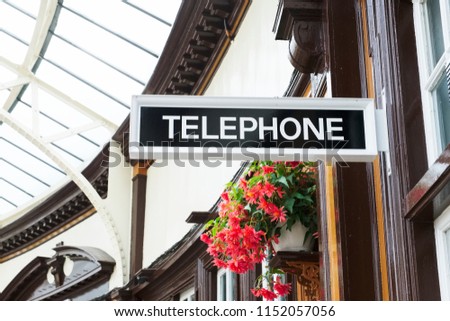 Telephone sign in victorian train station at Wemyss Bay in Scotland