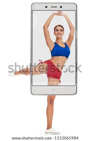 Fit woman stretching her leg isolated over white background. conceptual collage with device