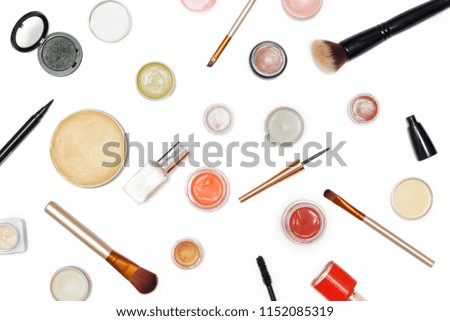 Top view of decorative cosmetics and brushes collection