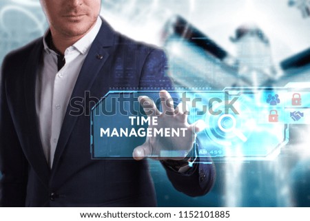 Business, Technology, Internet and network concept. Young businessman working on a virtual screen of the future and sees the inscription: Time management
