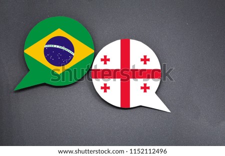 Brazil and Georgia flags with two speech bubbles on dark gray background