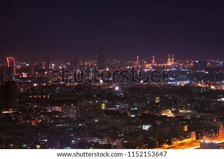 scenic of night cityscape of rainbow bridge in metropolis 