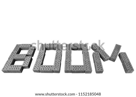 Black and white illustration of the word BOOM with toy bricks isolated on white.