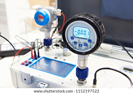 Standart pressure transmitter of portable calibrator Royalty-Free Stock Photo #1152197522