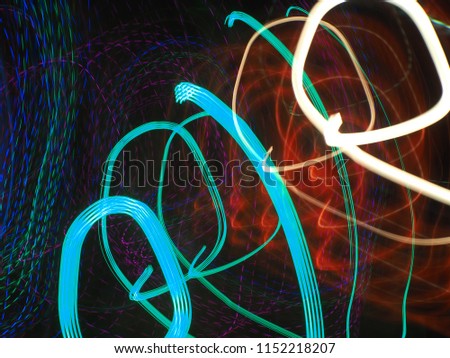 Long shutter speed of light, colorful shapes and lines, abstract background