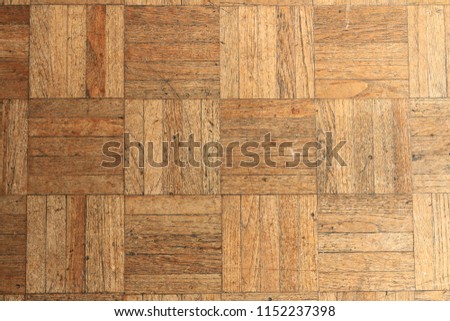 Close up of parquet flooring tiles. Close up of wooden fifties parquet flooring tiles from a lobby floor in England.