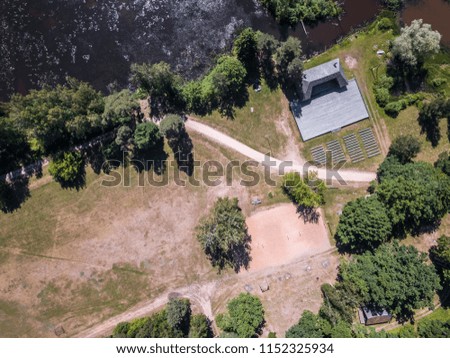 Drone Photo of the Open-air Stage in a Sunny Summer Day Surrounded with Trees