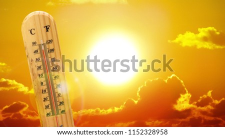 Heatwave hot sun. Climate Change. Global Warming. Thermometer high temperatures. Royalty-Free Stock Photo #1152328958