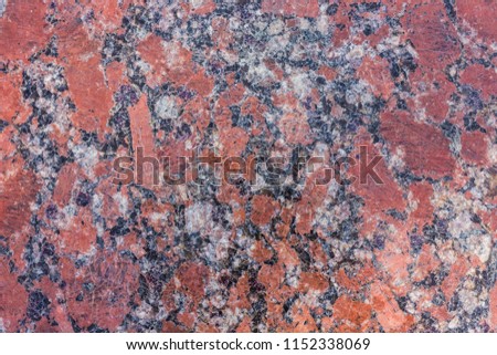 Texture of granite. Red, black and white elements. Tile for floor or walls. Natural pattern.