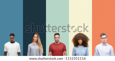 Group of people over vintage colors background skeptic and nervous, frowning upset because of problem. Negative person.